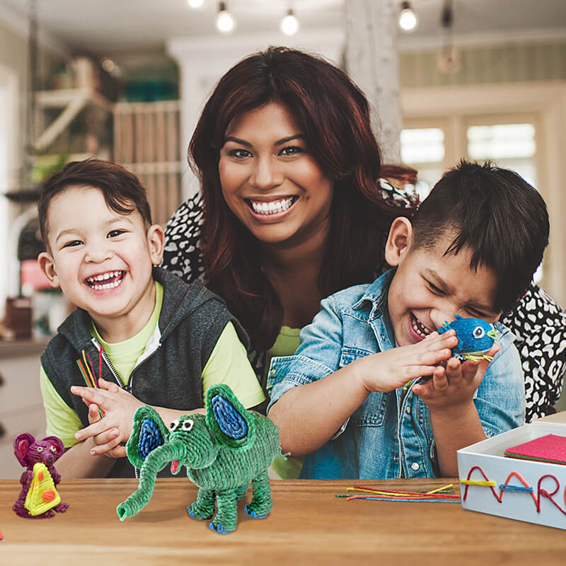 Mom with her kids crafting with Wikki Stix