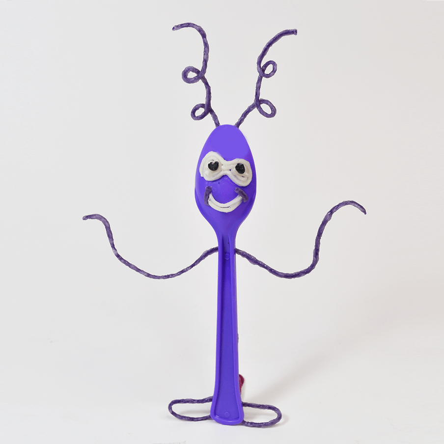Purple spoon with alien look.