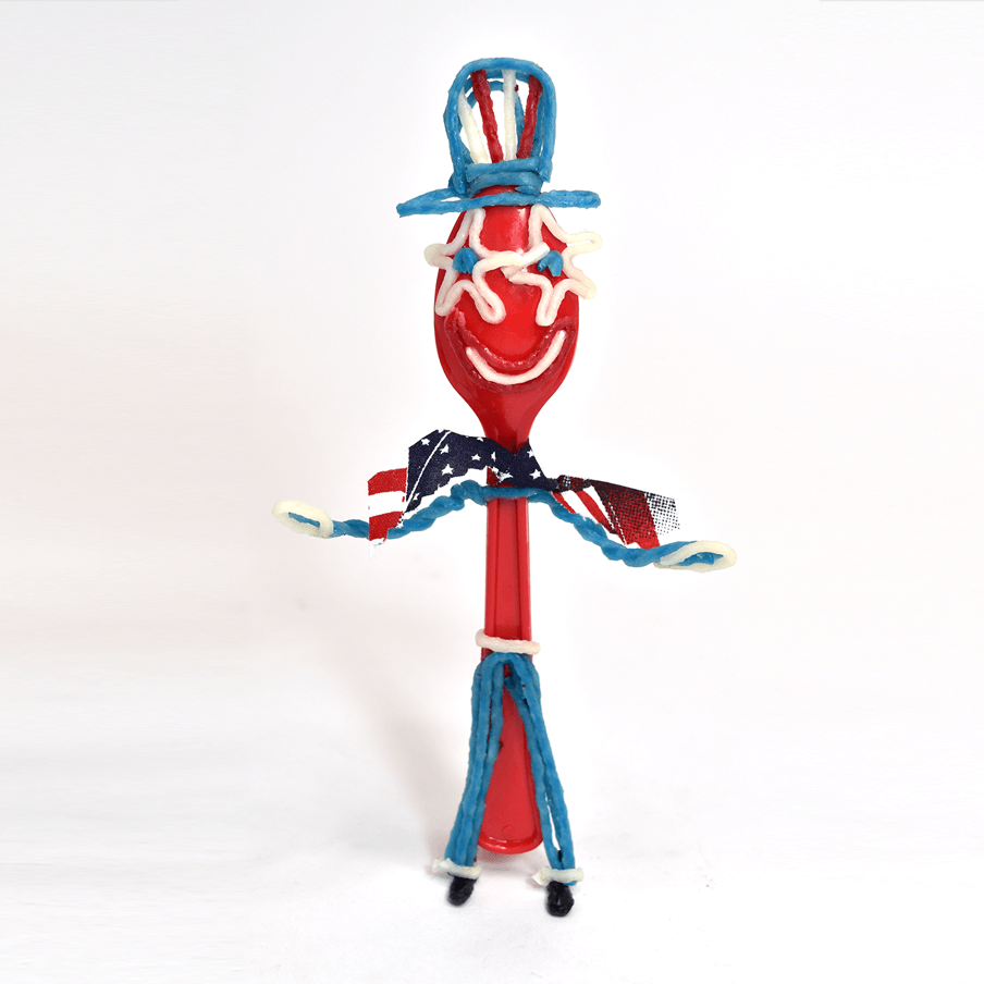 Red spoon decorated for 4th of July as Uncle Sam.