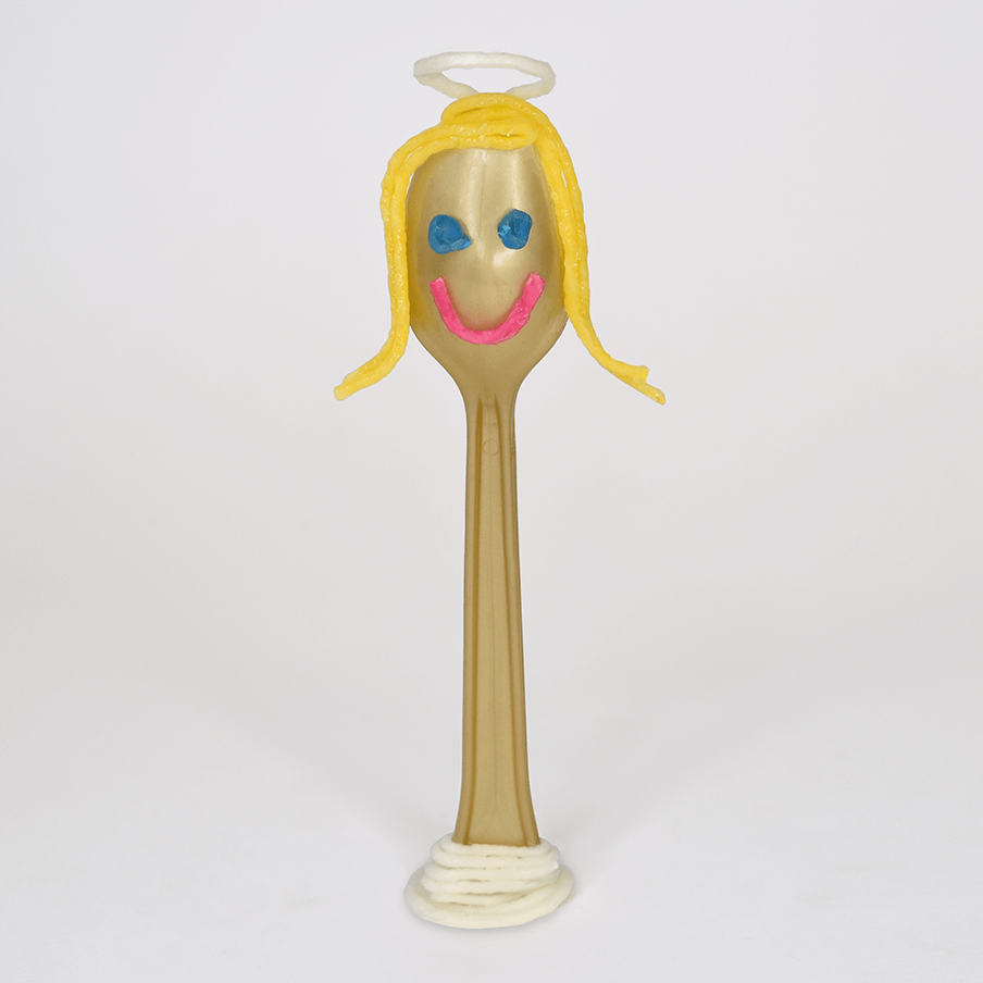 Gold spoon decorated to be an angel.