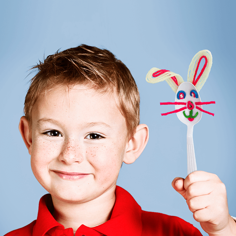 Boy Holding a Bunny Spoon created with Wikki Stix.