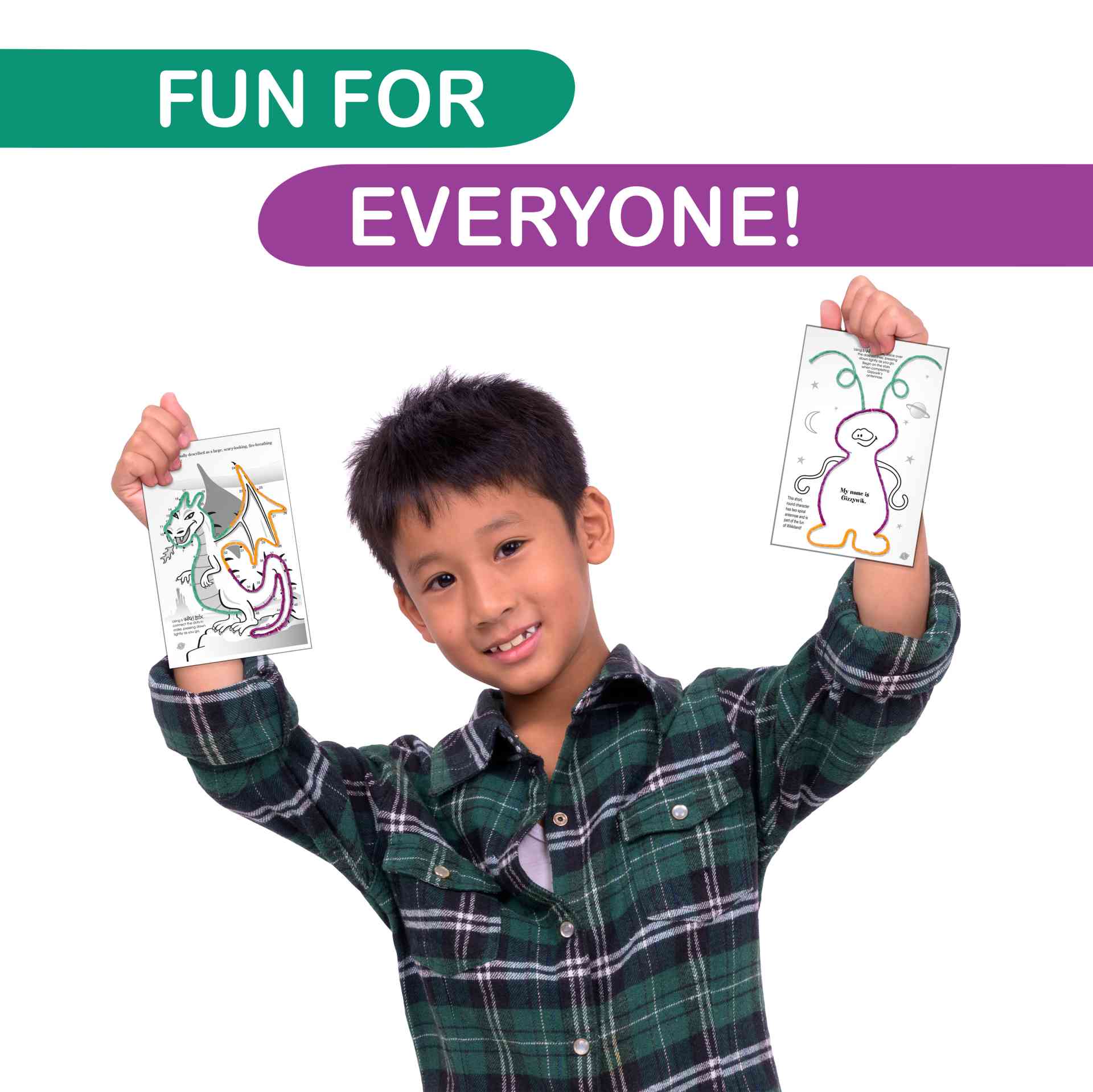 Boy holding two Make Believe Playsheets.