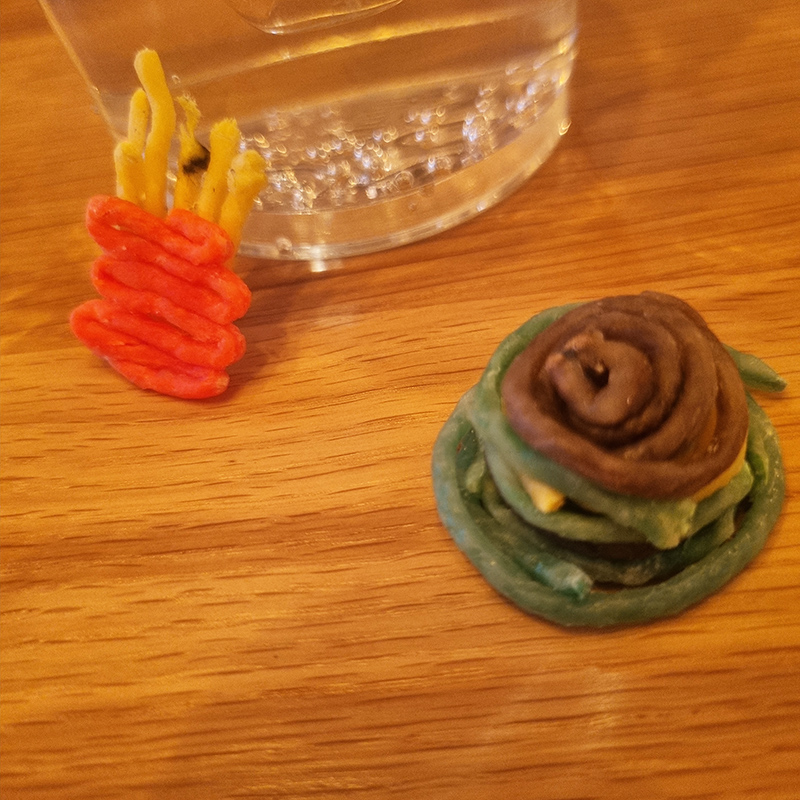 Hamburger and fries created with Wikki Stix.