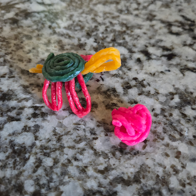 Turtle with a rock created with Wikki Stix.