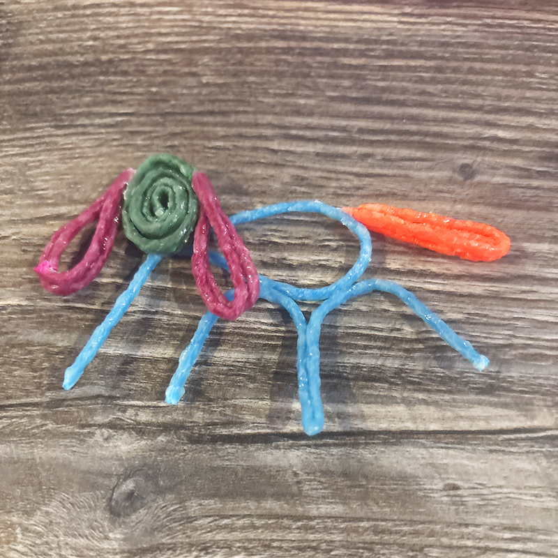 Puppy created with Wikki Stix.