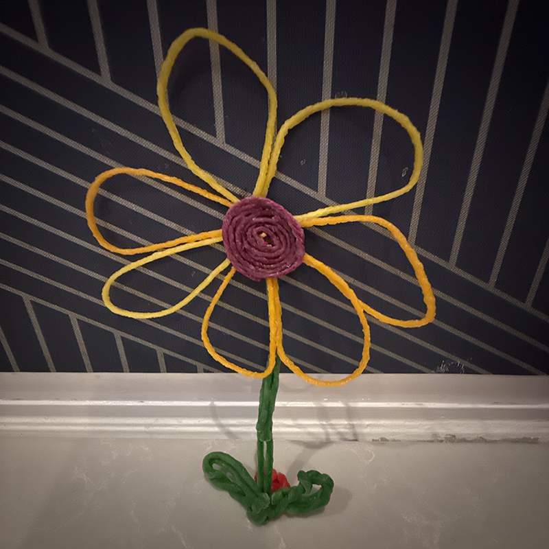 Flower created with Wikki Stix.